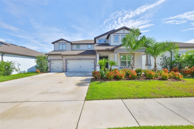 2866 Quail Crest Ct, Valrico, FL 33594 - craftsman-style home featuring concrete driveway, a garage, and a front yard