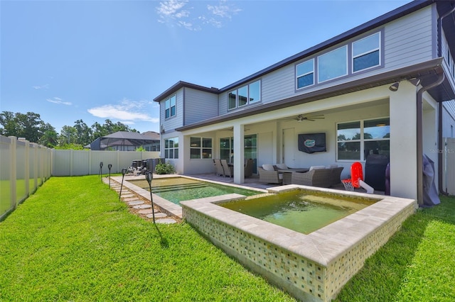 2866 Quail Crest Ct, Valrico, FL 33594 - back of property with a ceiling fan, a fenced backyard, outdoor lounge area, a patio area, and an in-ground hot tub