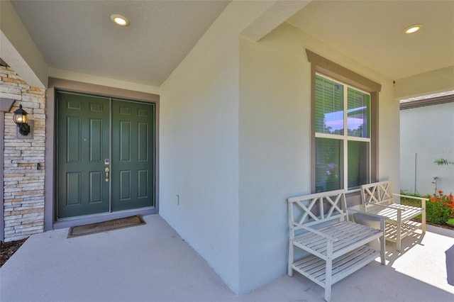 2866 Quail Crest Ct, Valrico, FL 33594 - view of exterior entry with stone siding and stucco siding