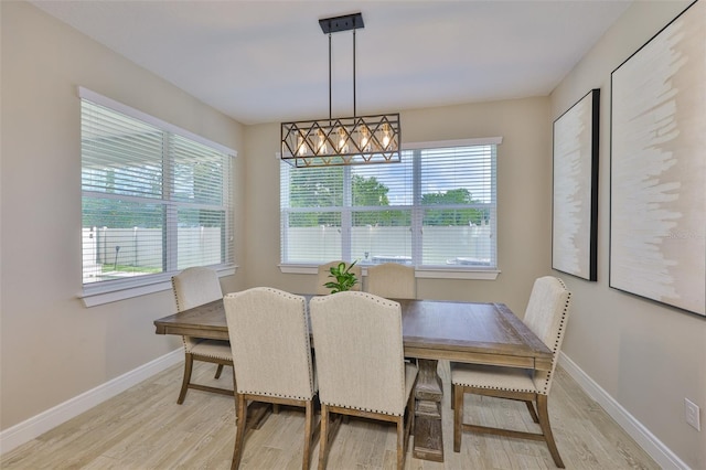 2866 Quail Crest Ct, Valrico, FL 33594 - dining area featuring light wood-type flooring and baseboards