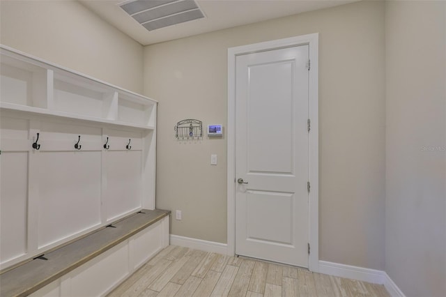 2866 Quail Crest Ct, Valrico, FL 33594 - mudroom with light wood-style floors and baseboards