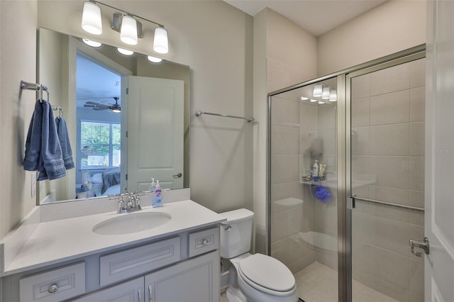 2866 Quail Crest Ct, Valrico, FL 33594 - ensuite bathroom with vanity, a stall shower, and ceiling fan