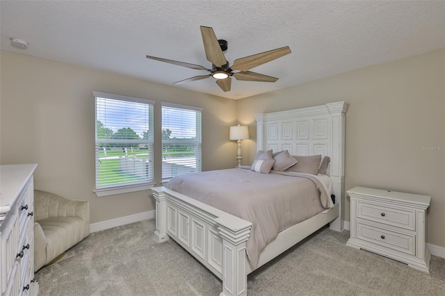 2866 Quail Crest Ct, Valrico, FL 33594 - bedroom featuring light colored carpet, a ceiling fan, and a textured ceiling