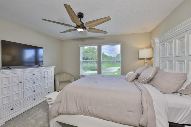 2866 Quail Crest Ct, Valrico, FL 33594 - bedroom featuring light carpet, ceiling fan, and a textured ceiling
