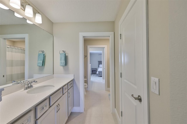 2866 Quail Crest Ct, Valrico, FL 33594 - full bath with vanity, a textured ceiling, and tile patterned floors