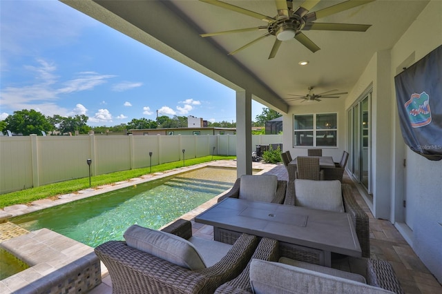 2866 Quail Crest Ct, Valrico, FL 33594 - fenced backyard featuring ceiling fan, outdoor dining area, and a patio area