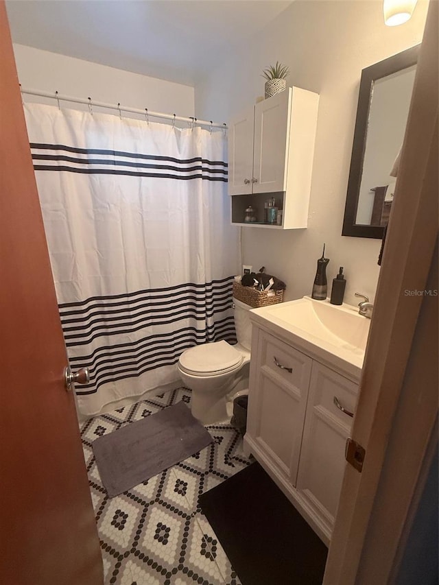 612 NW 9th Cir, Williston, FL 32696 - bathroom featuring vanity and tile patterned floors