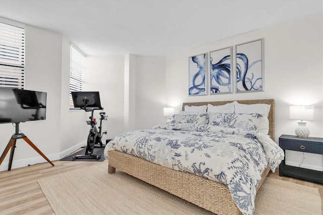 602 Lime Ave Unit 102, Clearwater, FL 33756 - bedroom featuring wood finished floors and baseboards