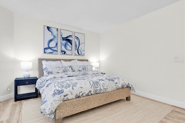 602 Lime Ave Unit 102, Clearwater, FL 33756 - bedroom featuring wood finished floors
