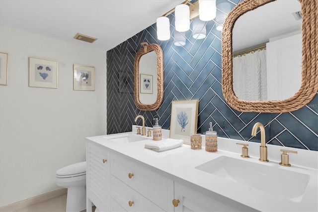 602 Lime Ave Unit 102, Clearwater, FL 33756 - full bathroom featuring double vanity and tile patterned floors