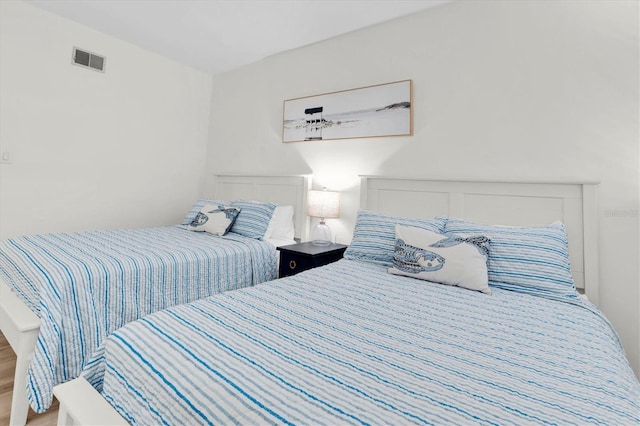 602 Lime Ave Unit 102, Clearwater, FL 33756 - bedroom with wood finished floors