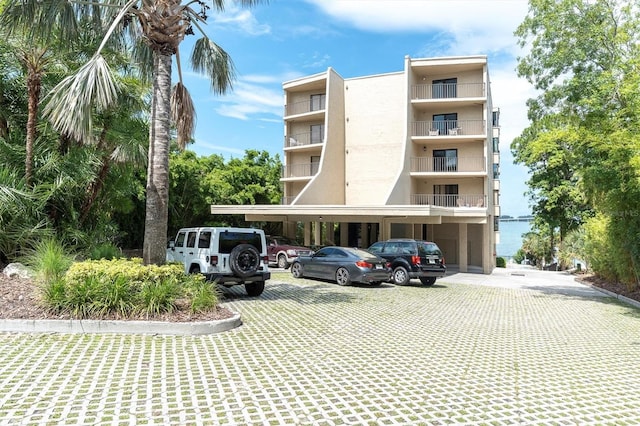 602 Lime Ave Unit 102, Clearwater, FL 33756 - view of property with uncovered parking