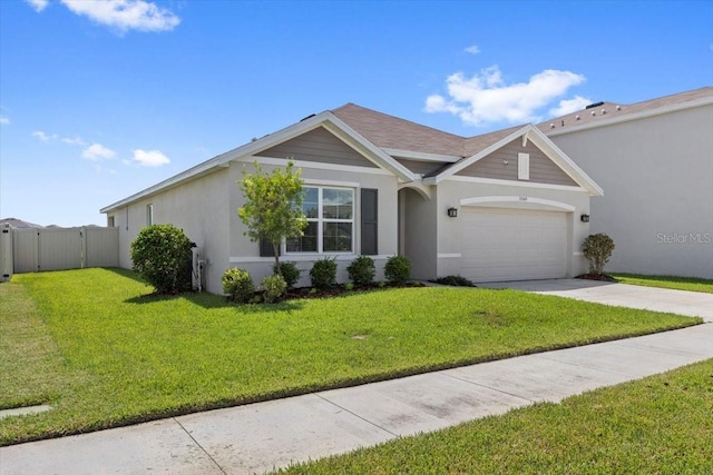33369 Hamilton Hill Ln, Wesley Chapel, FL 33545 - view of front of home featuring concrete driveway, an attached garage, and stucco siding