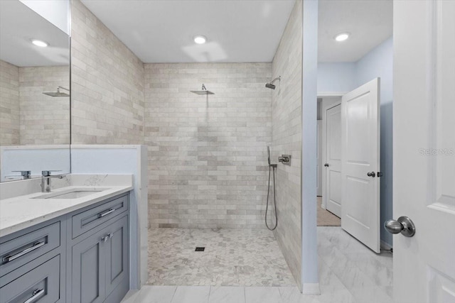 33369 Hamilton Hill Ln, Wesley Chapel, FL 33545 - full bath with a tile shower and vanity