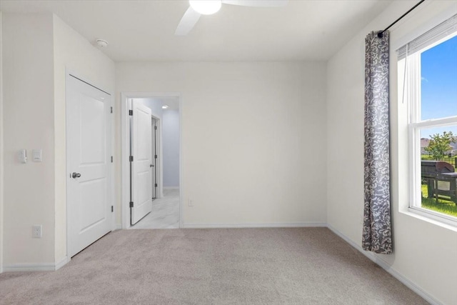 33369 Hamilton Hill Ln, Wesley Chapel, FL 33545 - spare room featuring a smoke detector, light colored carpet, and ceiling fan