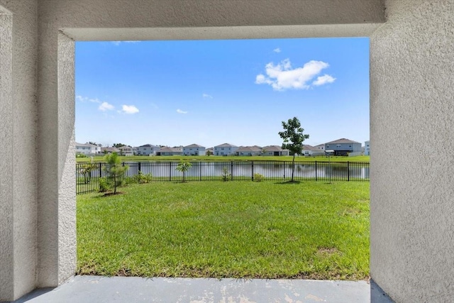 33369 Hamilton Hill Ln, Wesley Chapel, FL 33545 - fenced backyard featuring a water view and a residential view