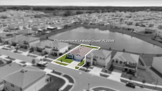 33369 Hamilton Hill Ln, Wesley Chapel, FL 33545 - aerial overview of property's location featuring property parcel outlined