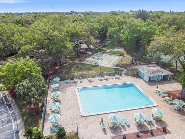 3335 Fox Hunt Dr, Palm Harbor, FL 34683 - community pool with a forest view