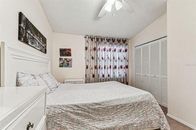 3335 Fox Hunt Dr, Palm Harbor, FL 34683 - carpeted bedroom featuring a textured ceiling, a closet, and a ceiling fan