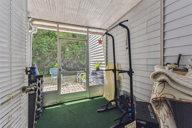 3335 Fox Hunt Dr, Palm Harbor, FL 34683 - workout room featuring carpet flooring