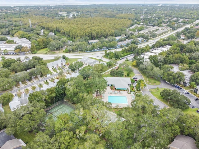 3335 Fox Hunt Dr, Palm Harbor, FL 34683 - aerial view of property's location with a pool and a heavily wooded area