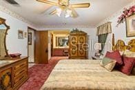 5781 S Utopia Ter, Inverness, FL 34452 - bedroom with dark carpet