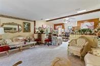 5781 S Utopia Ter, Inverness, FL 34452 - living room featuring carpet floors
