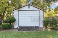 5781 S Utopia Ter, Inverness, FL 34452 - detached garage with a storage shed