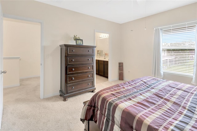 12710 Buffalo Run Dr, Gibsonton, FL 33534 - bedroom featuring light colored carpet and connected bathroom