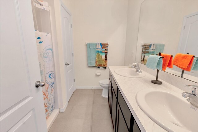12710 Buffalo Run Dr, Gibsonton, FL 33534 - bathroom with double vanity, tile patterned flooring, and a shower with shower curtain