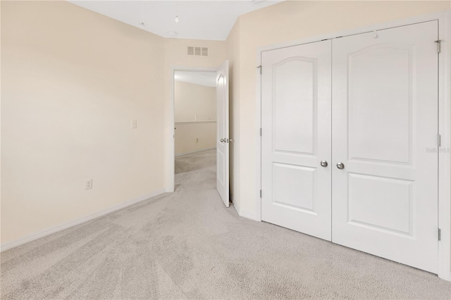 12710 Buffalo Run Dr, Gibsonton, FL 33534 - unfurnished bedroom featuring light colored carpet and a closet