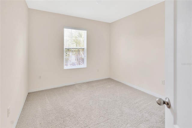 12710 Buffalo Run Dr, Gibsonton, FL 33534 - spare room with carpet and baseboards