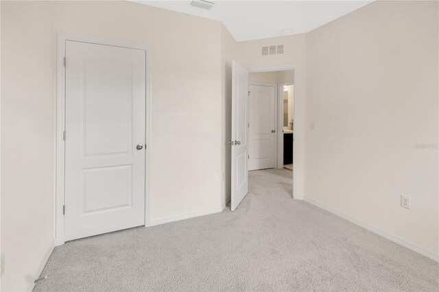 12710 Buffalo Run Dr, Gibsonton, FL 33534 - unfurnished bedroom with light colored carpet and baseboards