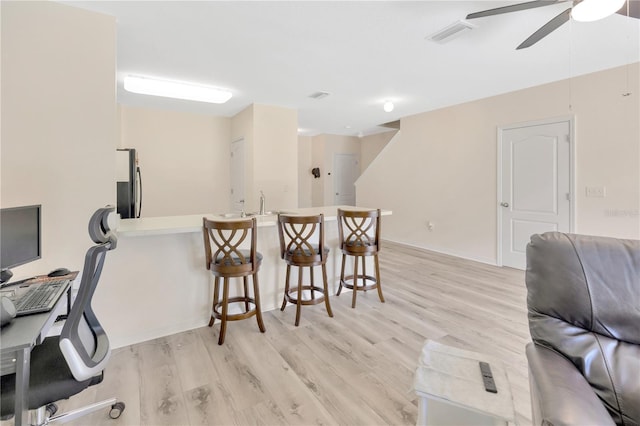 12710 Buffalo Run Dr, Gibsonton, FL 33534 - office space with a ceiling fan and light wood-type flooring