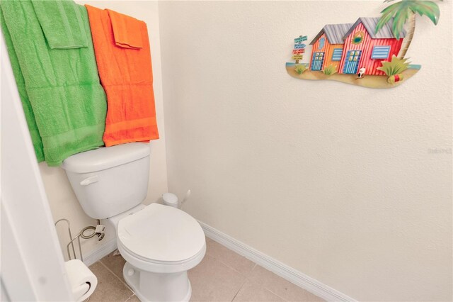 12710 Buffalo Run Dr, Gibsonton, FL 33534 - bathroom featuring toilet and tile patterned flooring