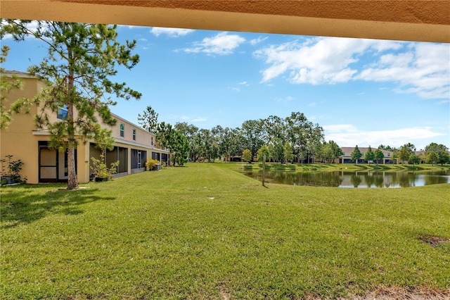 12710 Buffalo Run Dr, Gibsonton, FL 33534 - view of green lawn featuring a water view