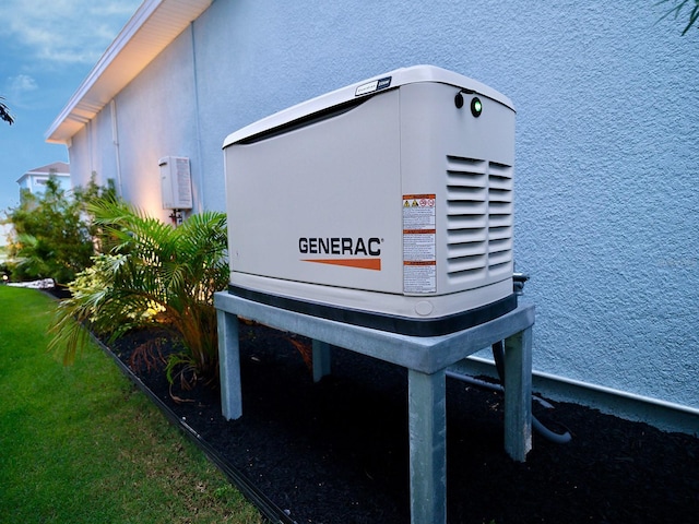 5307 Wishing Arch Dr, Apollo Beach, FL 33572 - exterior view of a power unit and stucco siding