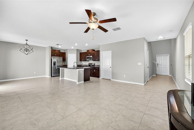 13324 Willow Bluestar Loop, Riverview, FL 33579 - unfurnished living room with a ceiling fan, light tile patterned floors, and recessed lighting