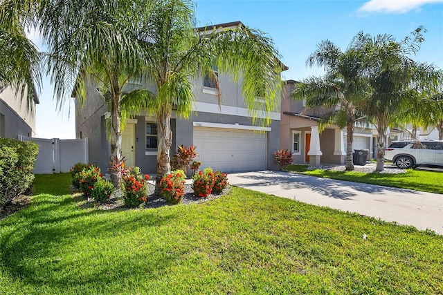 13324 Willow Bluestar Loop, Riverview, FL 33579 - obstructed view of property with concrete driveway, a garage, and stucco siding