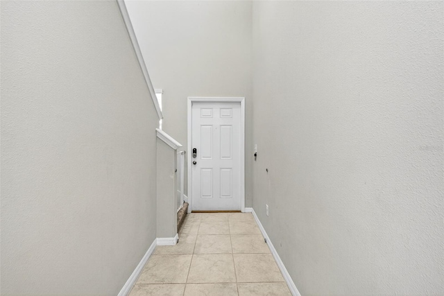13324 Willow Bluestar Loop, Riverview, FL 33579 - corridor featuring light tile patterned floors and baseboards