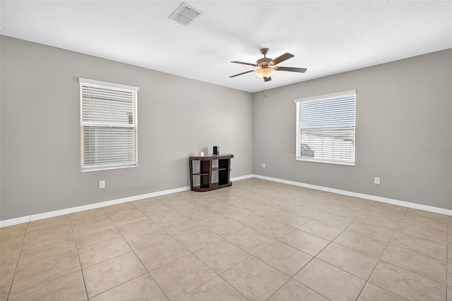 13324 Willow Bluestar Loop, Riverview, FL 33579 - unfurnished room with ceiling fan and light tile patterned floors