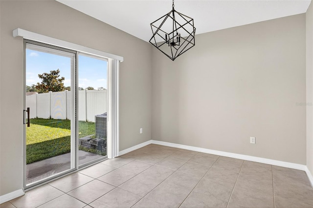 13324 Willow Bluestar Loop, Riverview, FL 33579 - unfurnished room featuring a chandelier and tile patterned flooring