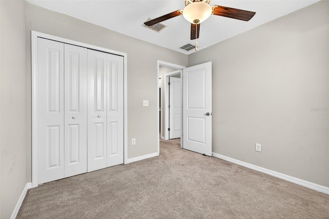13324 Willow Bluestar Loop, Riverview, FL 33579 - unfurnished bedroom with carpet flooring, a closet, and a ceiling fan