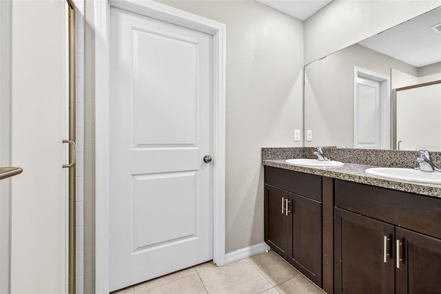 13324 Willow Bluestar Loop, Riverview, FL 33579 - full bath with double vanity, a shower stall, and tile patterned flooring