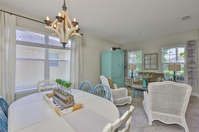 11044 Spring Point Cir, Riverview, FL 33579 - dining space featuring a chandelier
