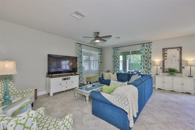 11044 Spring Point Cir, Riverview, FL 33579 - living area featuring light tile patterned floors and ceiling fan