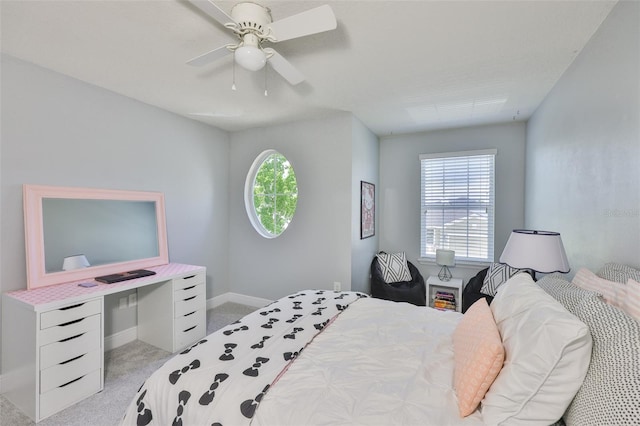 11044 Spring Point Cir, Riverview, FL 33579 - bedroom with light colored carpet, multiple windows, and ceiling fan