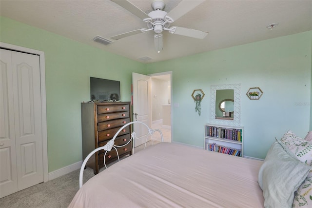 11044 Spring Point Cir, Riverview, FL 33579 - carpeted bedroom featuring a closet and a ceiling fan