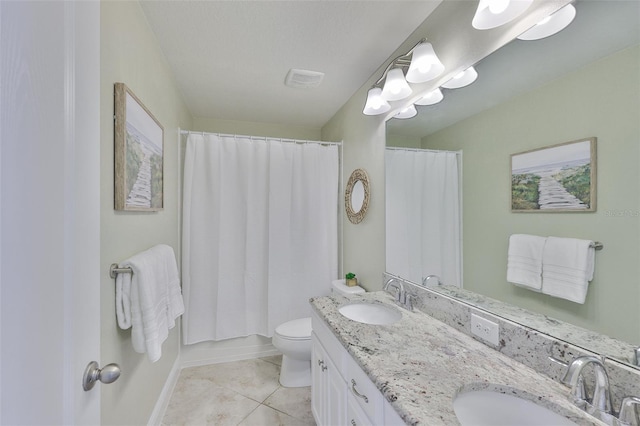 11044 Spring Point Cir, Riverview, FL 33579 - bathroom featuring tile patterned flooring and double vanity