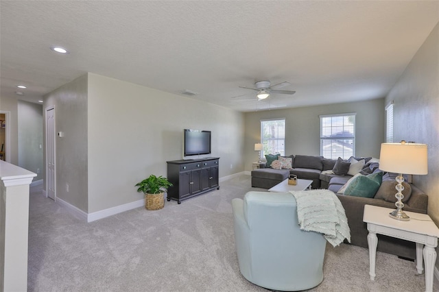 11044 Spring Point Cir, Riverview, FL 33579 - living room with light colored carpet, a ceiling fan, and recessed lighting
